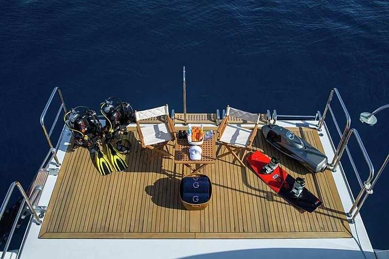 a toy ship on a deck aboard GALAXY Yacht for Sale