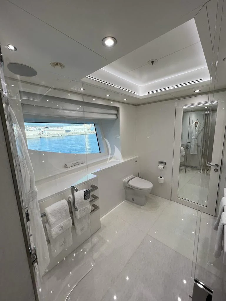 a bathroom with a glass shower aboard GALAXY Yacht for Sale