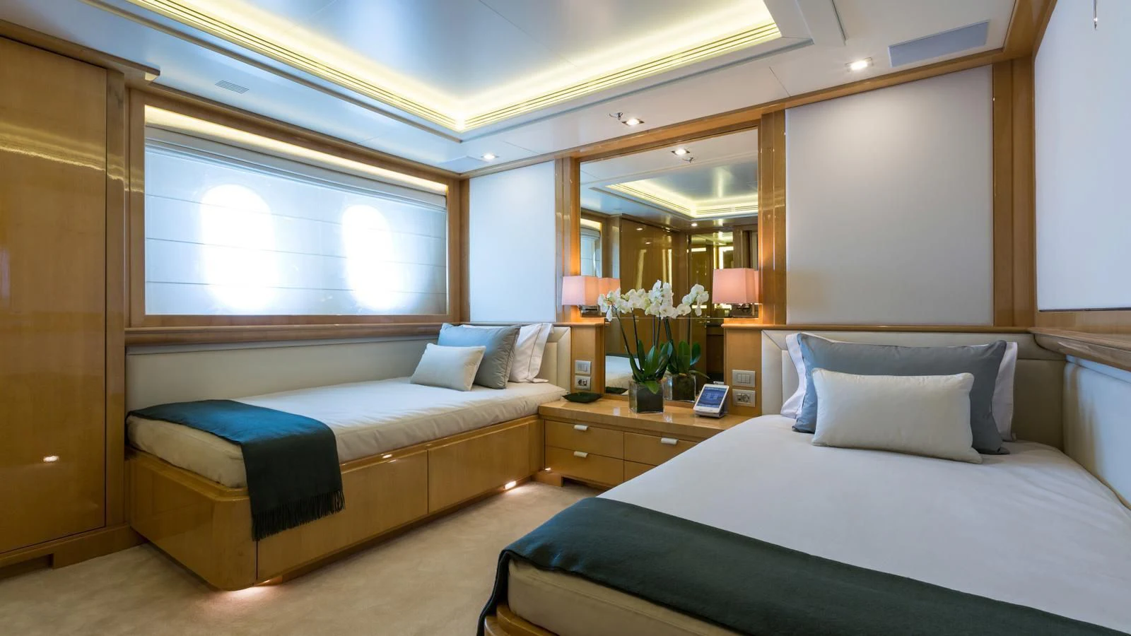 a room with a bed and a desk aboard GALAXY Yacht for Sale