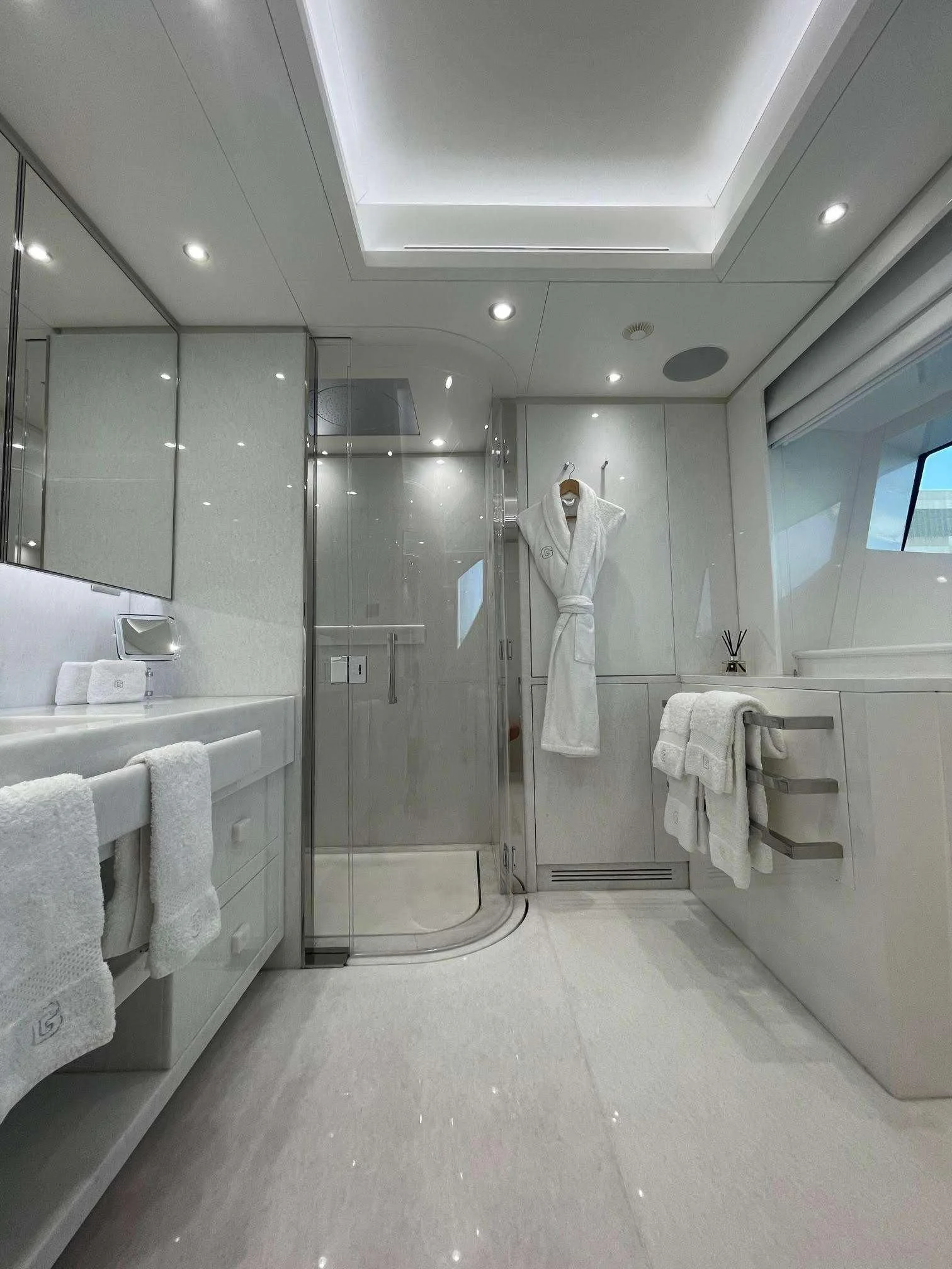 a bathroom with a glass shower aboard GALAXY Yacht for Sale