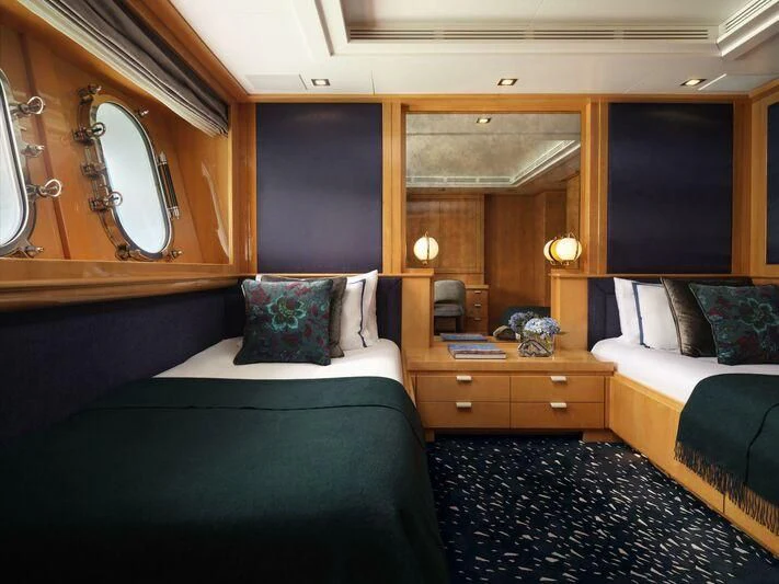 a room with two beds aboard GALAXY Yacht for Sale