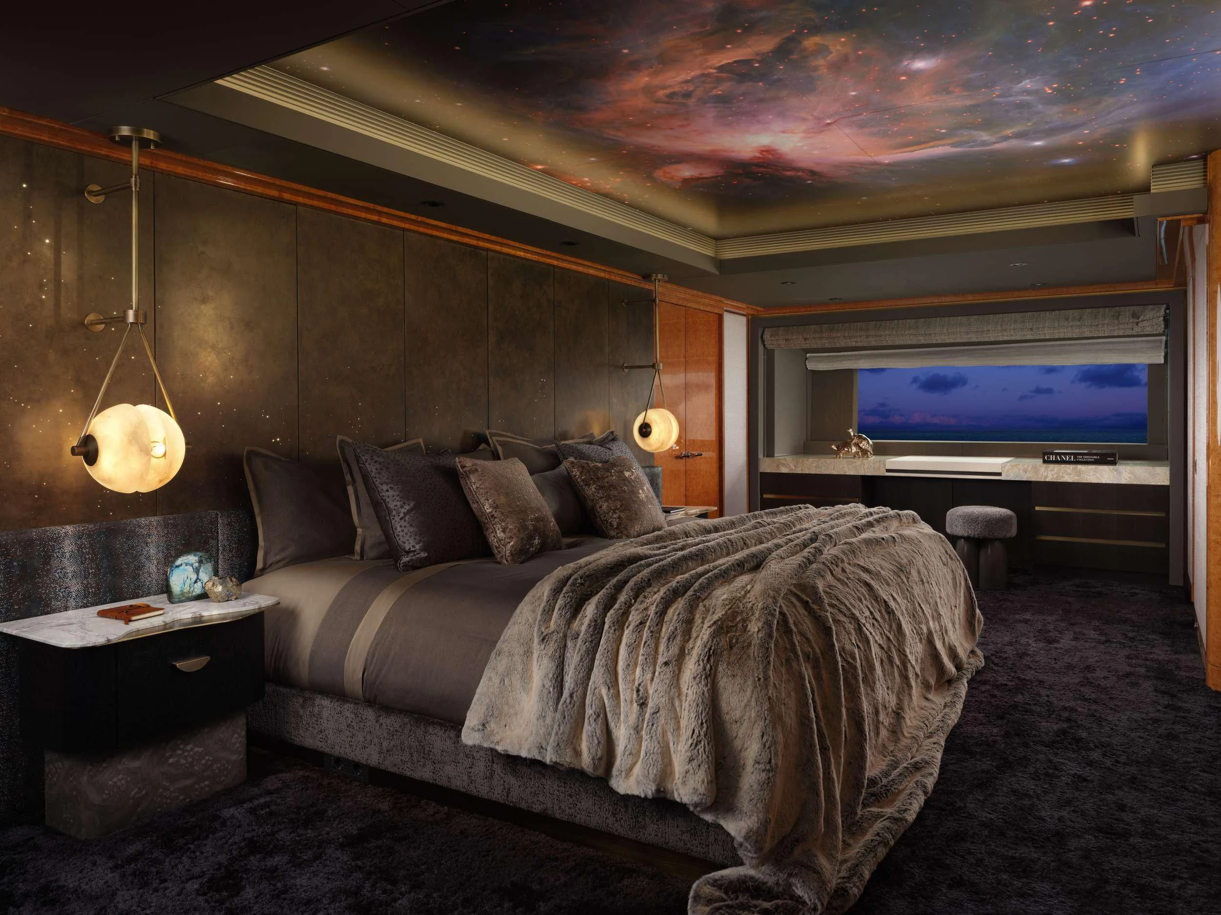 a living room with a large bed aboard GALAXY Yacht for Sale