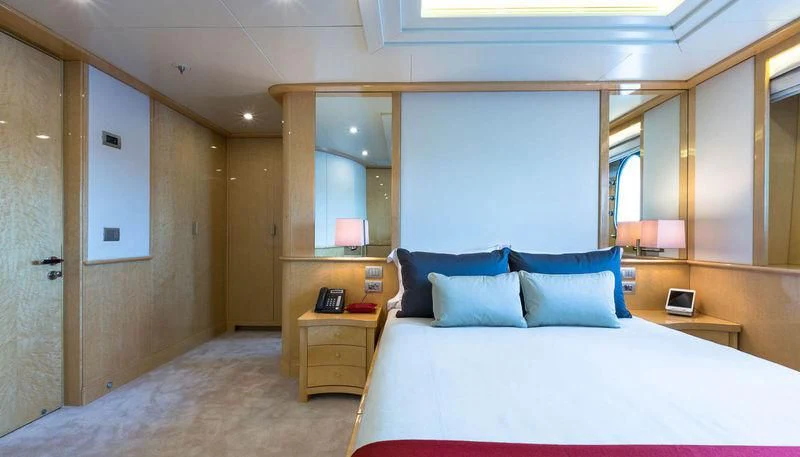 a bed in a room aboard GALAXY Yacht for Sale