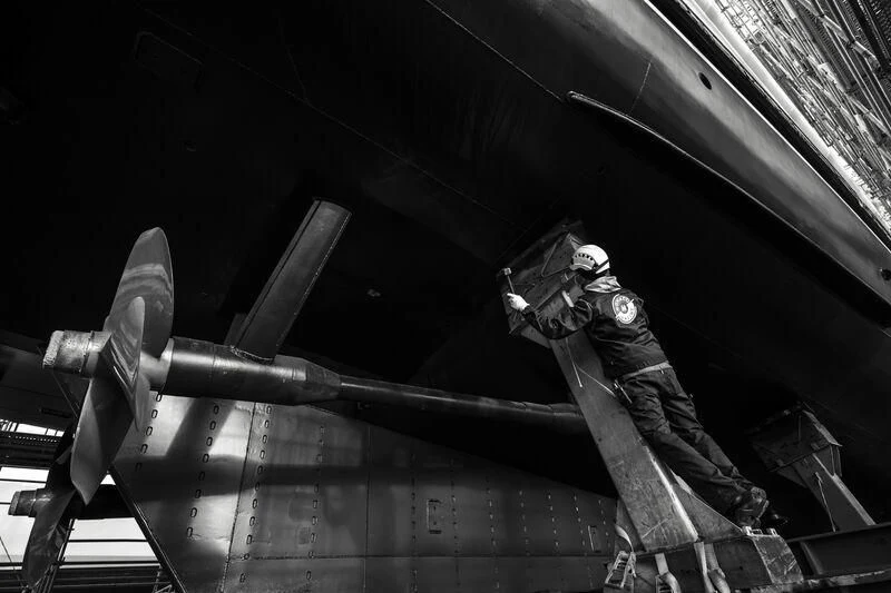 a man in a helmet climbing a plane aboard GALAXY Yacht for Sale