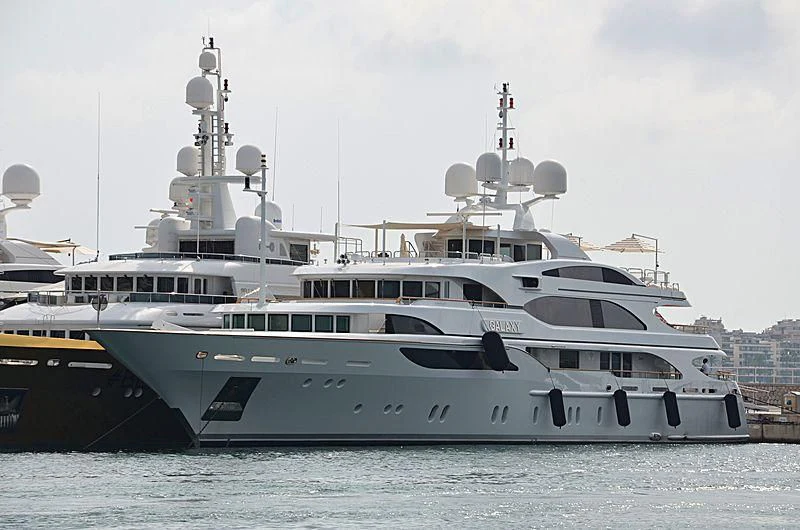a couple of large white boats in the water aboard GALAXY Yacht for Sale