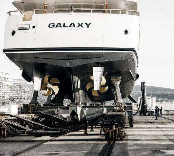 a large military ship aboard GALAXY Yacht for Sale