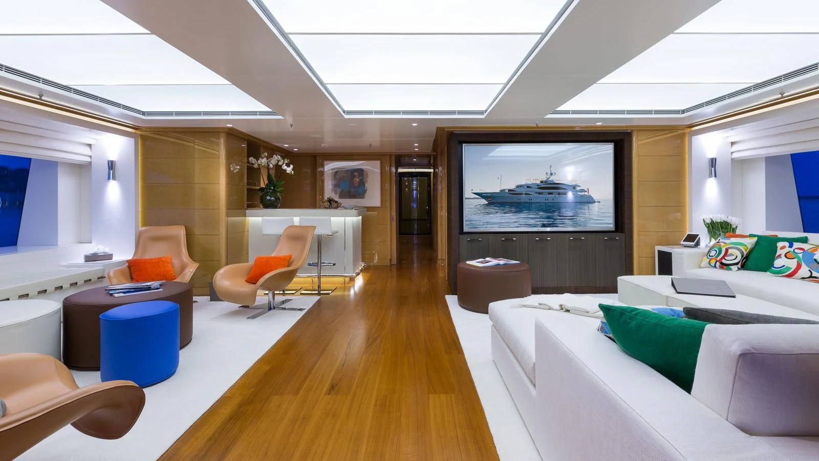 a room with a large television aboard GALAXY Yacht for Sale