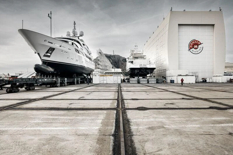 a large airplane sits on a runway aboard GALAXY Yacht for Sale