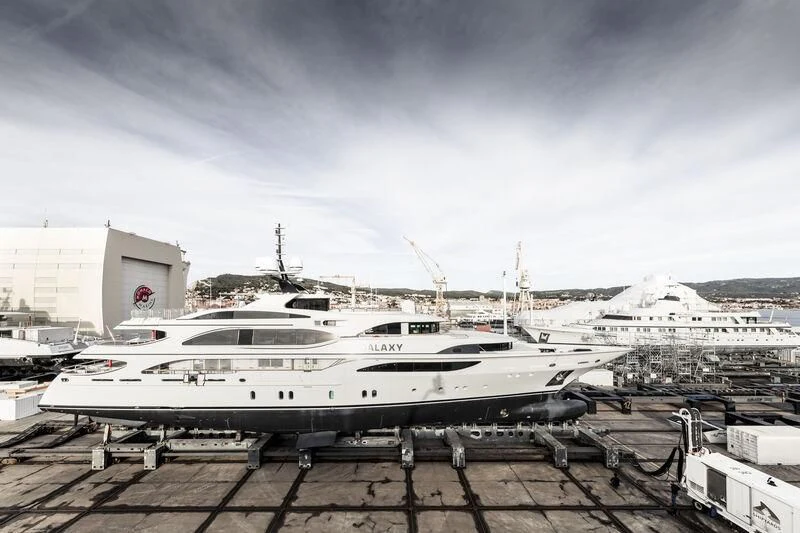 a boat parked in a harbor aboard GALAXY Yacht for Sale