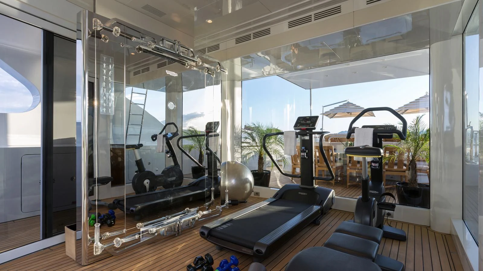 a gym with exercise equipment aboard GALAXY Yacht for Sale