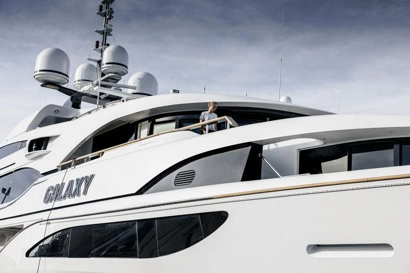 a person standing on a yacht aboard GALAXY Yacht for Sale