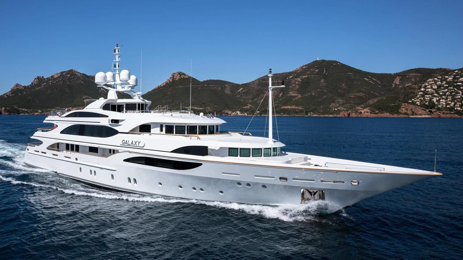 a white yacht on the water aboard GALAXY Yacht for Sale