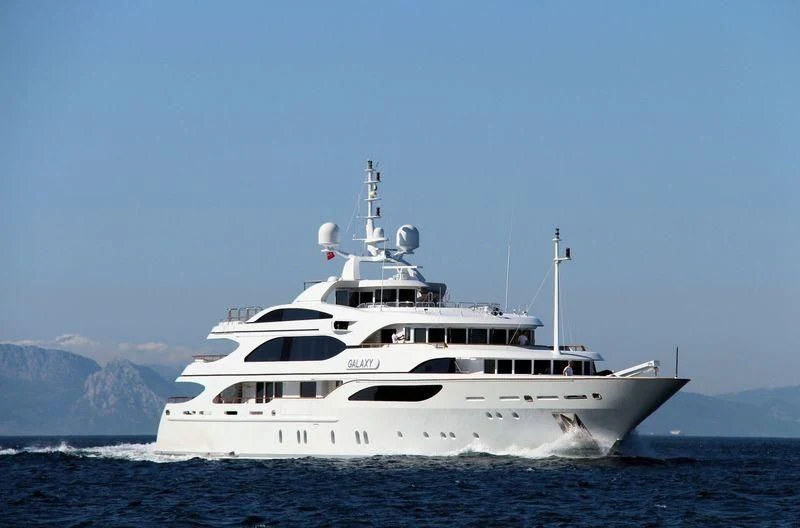 a white boat in the water aboard GALAXY Yacht for Sale