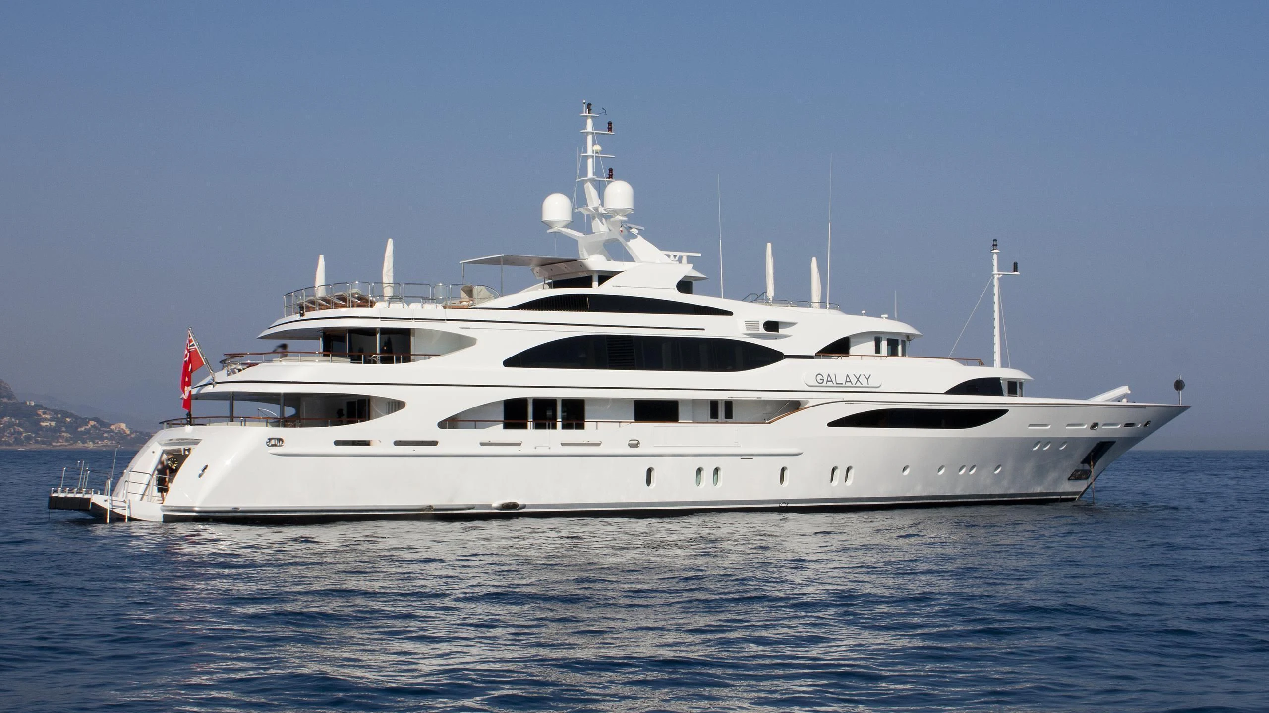 a white yacht on the water aboard GALAXY Yacht for Sale