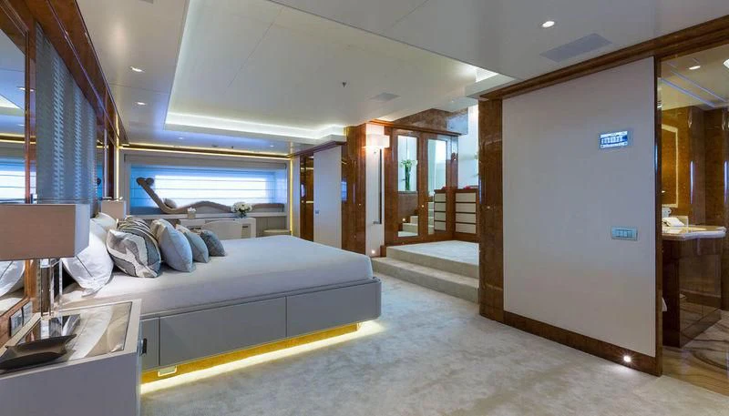 a room with a bed and a door aboard GALAXY Yacht for Sale