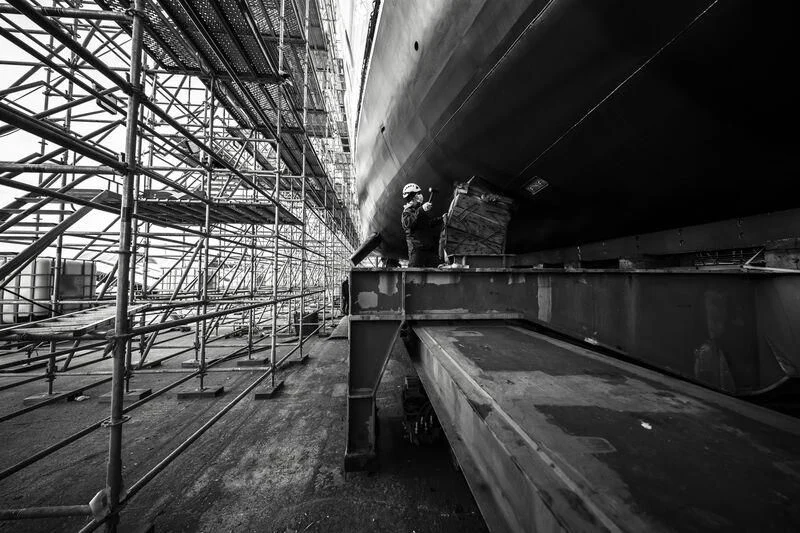 a few men working in a construction site aboard GALAXY Yacht for Sale