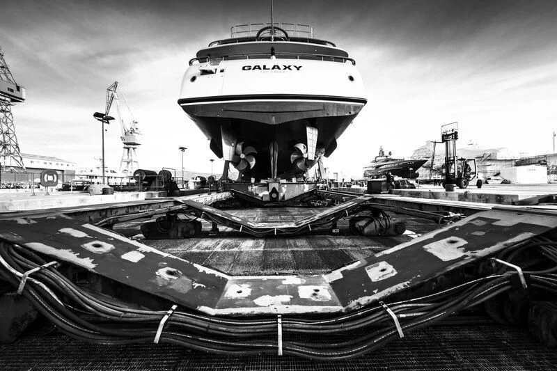 a large ship on a dock aboard GALAXY Yacht for Sale
