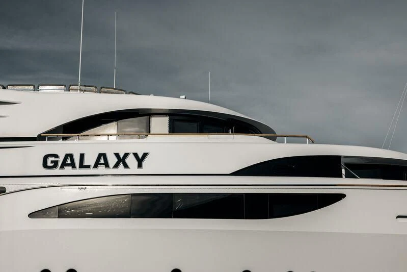 a white yacht with a name on the front aboard GALAXY Yacht for Sale