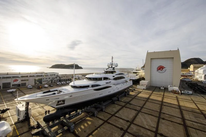 a large cruise ship docked aboard GALAXY Yacht for Sale