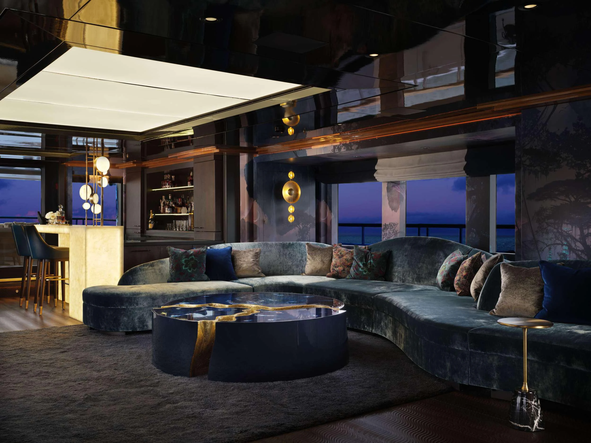 a living room with a couch and a table aboard GALAXY Yacht for Sale