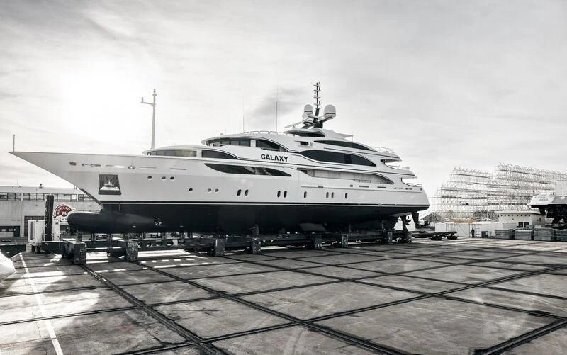 a large white airplane aboard GALAXY Yacht for Sale