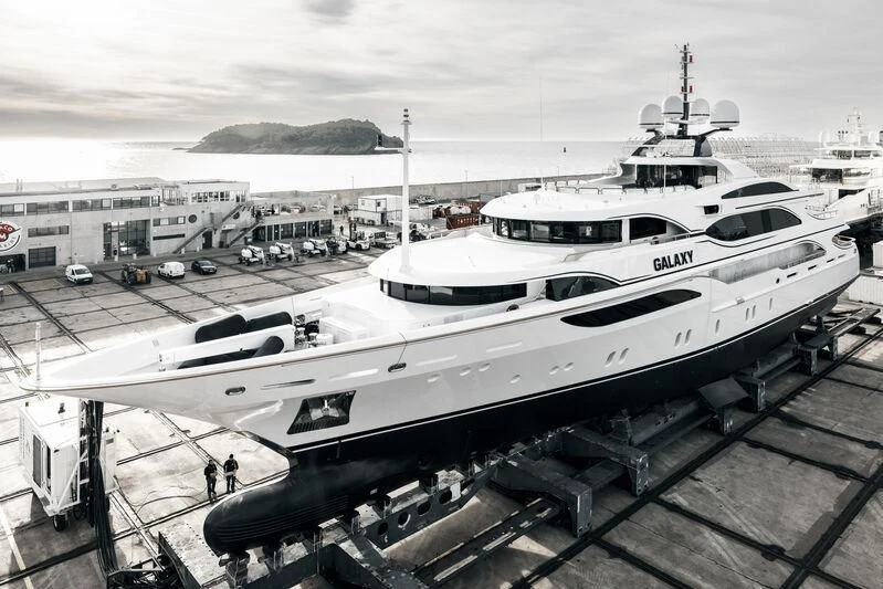 a white yacht in a dock aboard GALAXY Yacht for Sale
