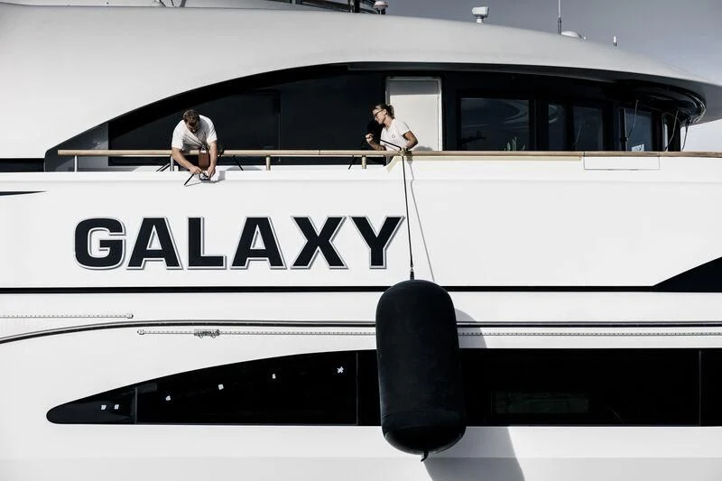 people sitting on a bench aboard GALAXY Yacht for Sale