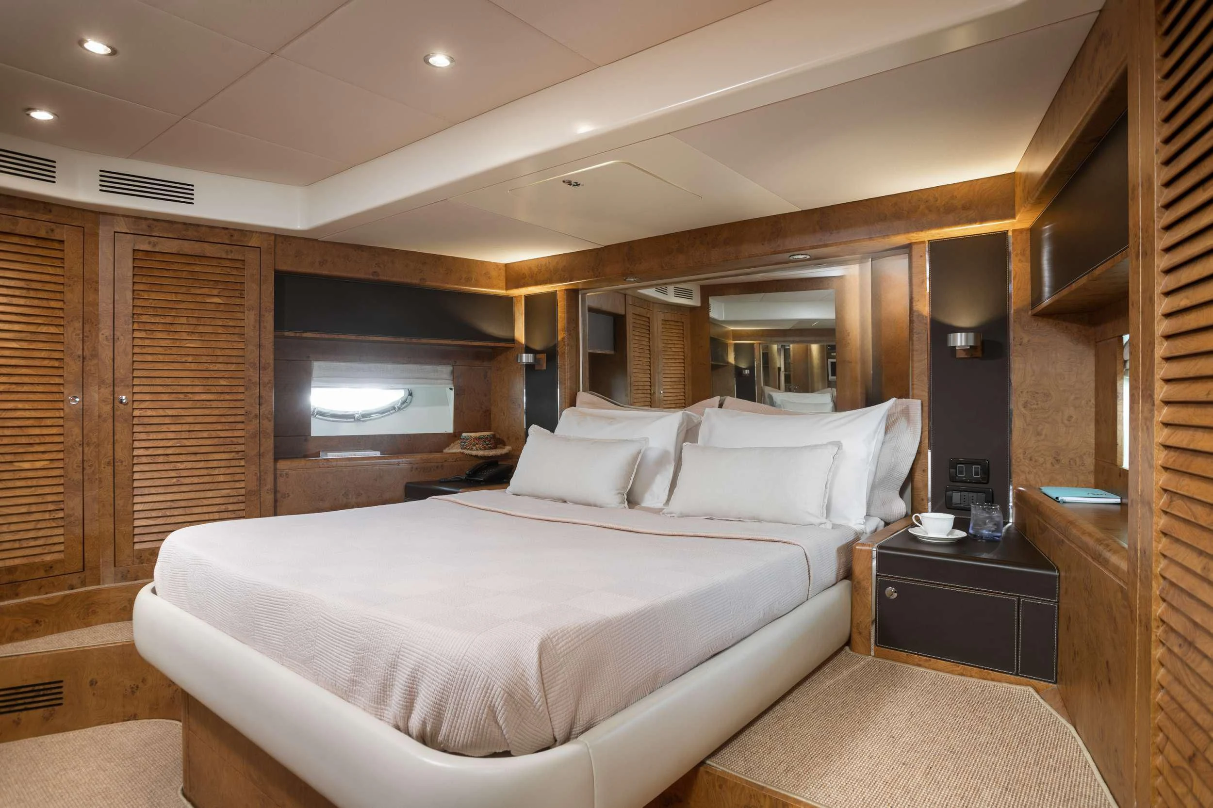 a large bed in a room aboard ANLIA Yacht for Sale