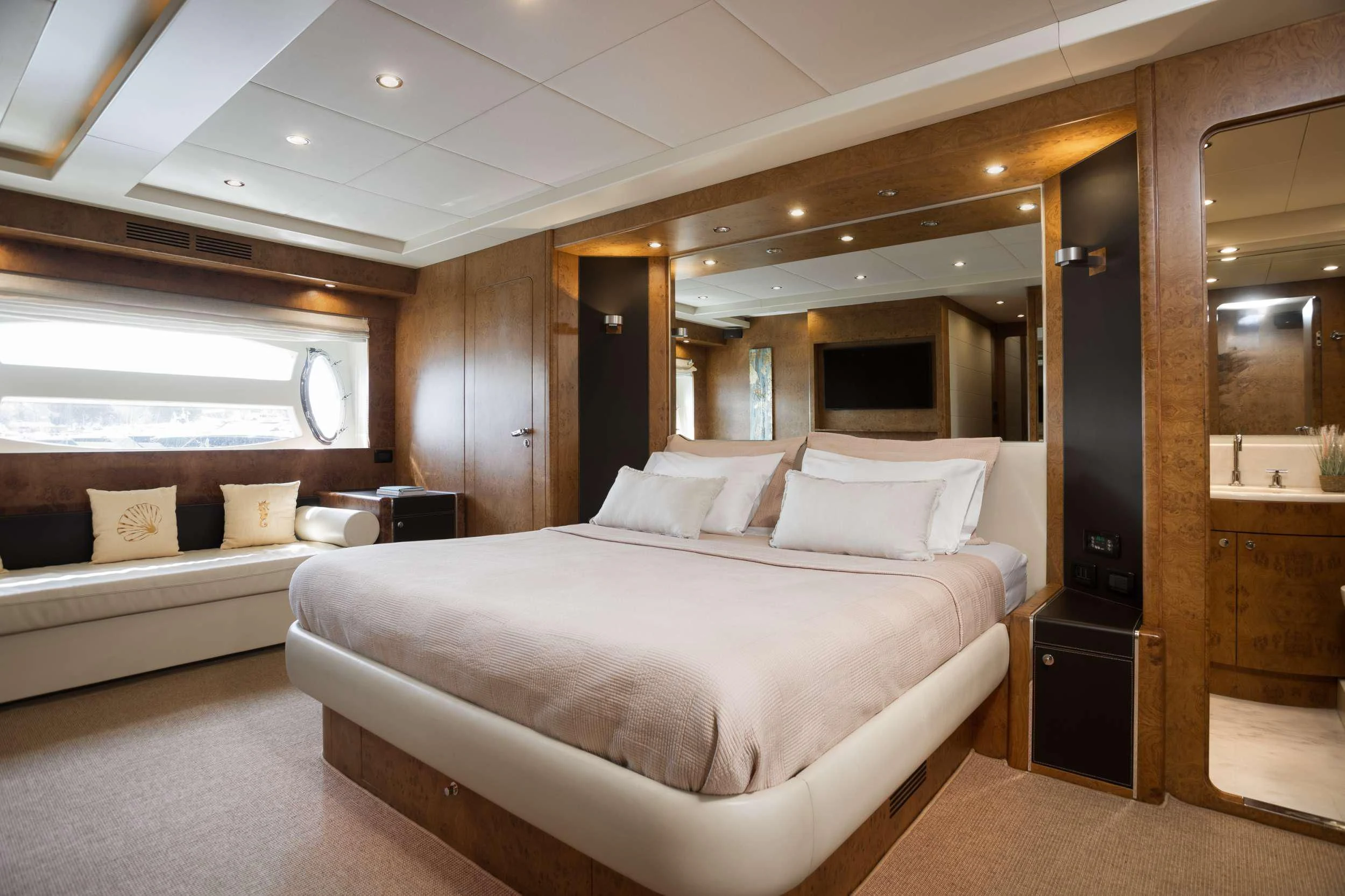a large bed in a room aboard ANLIA Yacht for Sale