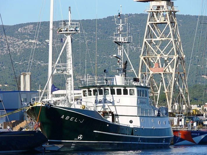 a large boat in the water aboard ABEL J Yacht for Sale