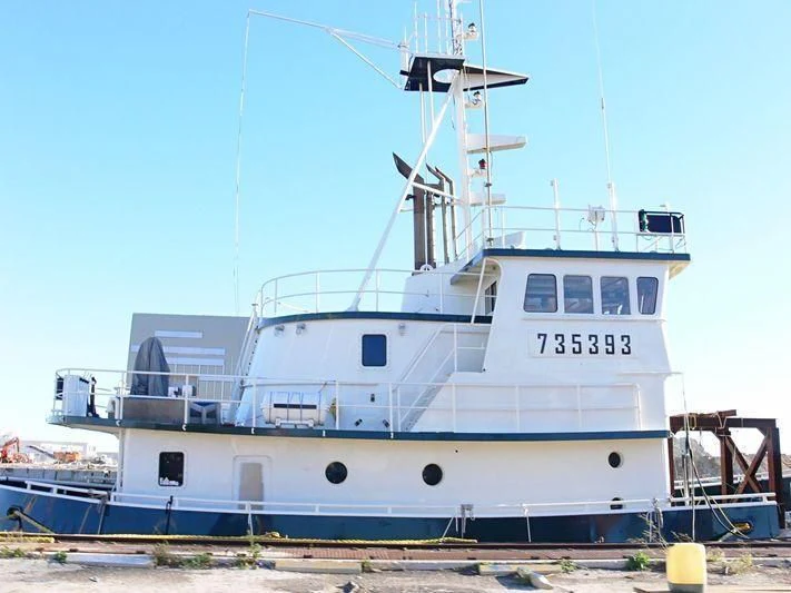 a large white boat aboard ABEL J Yacht for Sale