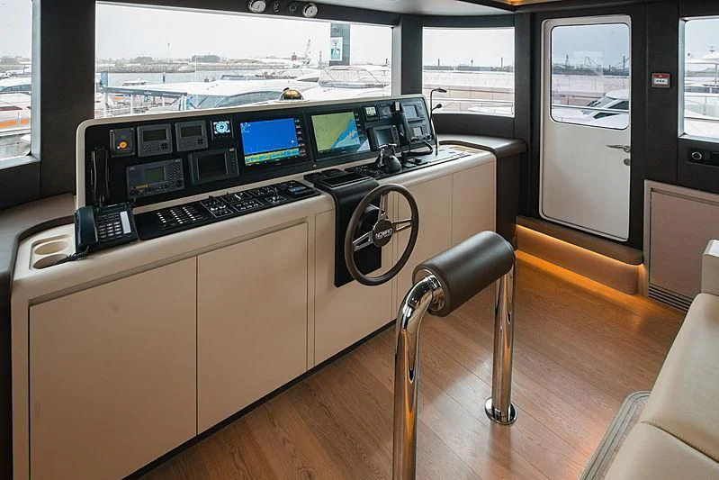 a large room with computers aboard DIGNITY Yacht for Sale