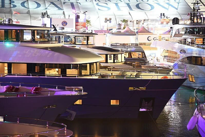 a boat in a large room aboard DIGNITY Yacht for Sale