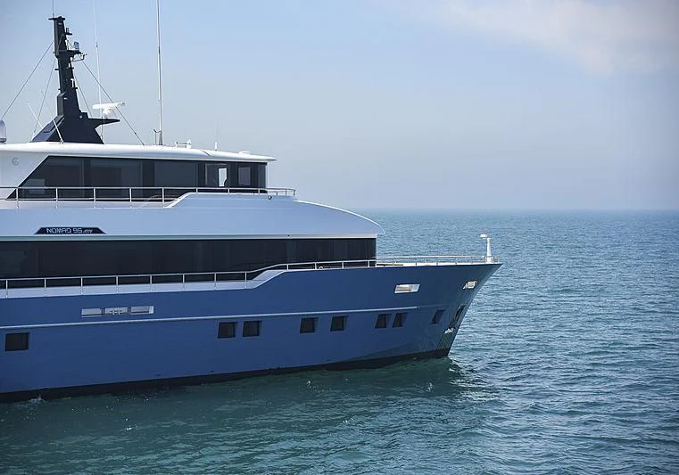 a large boat in the water aboard DIGNITY Yacht for Sale