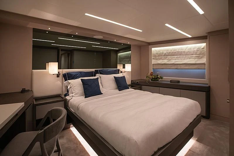a bed in a room aboard DIGNITY Yacht for Sale