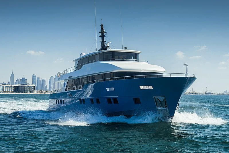 a large boat in the water aboard DIGNITY Yacht for Sale