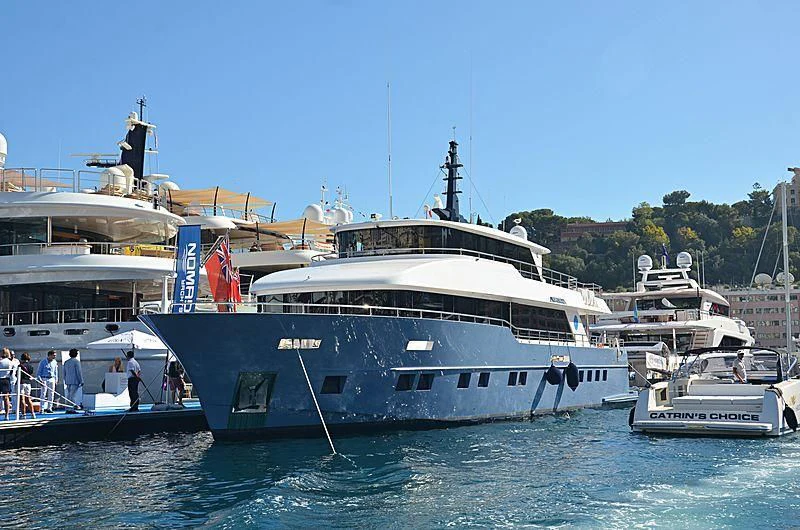 a large white boat with people on it aboard DIGNITY Yacht for Sale