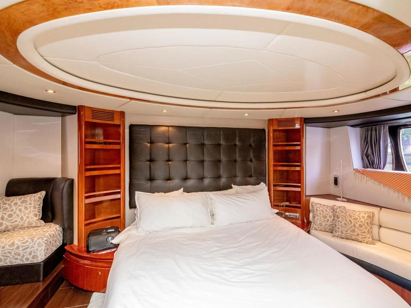 a large bed with white sheets aboard NUEVA OLA Yacht for Sale