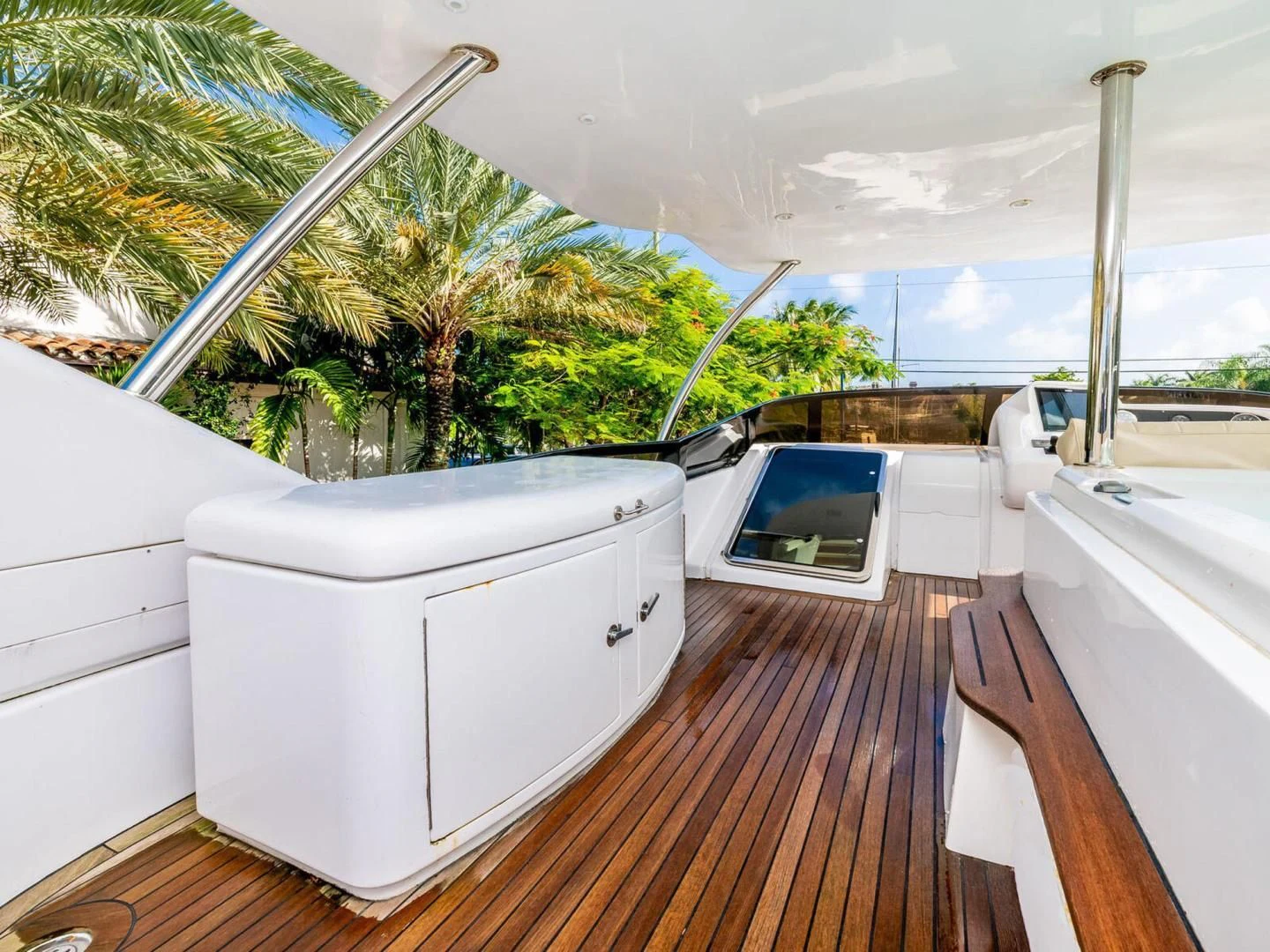 a deck with a tub and a hammock on it aboard NUEVA OLA Yacht for Sale