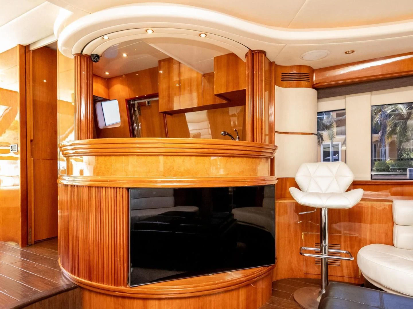 a room with a fireplace aboard NUEVA OLA Yacht for Sale