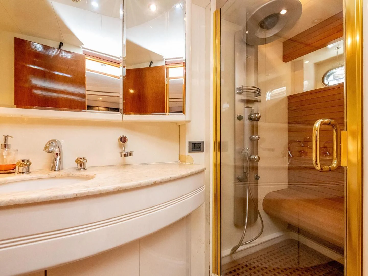 a bathroom with a glass shower aboard NUEVA OLA Yacht for Sale