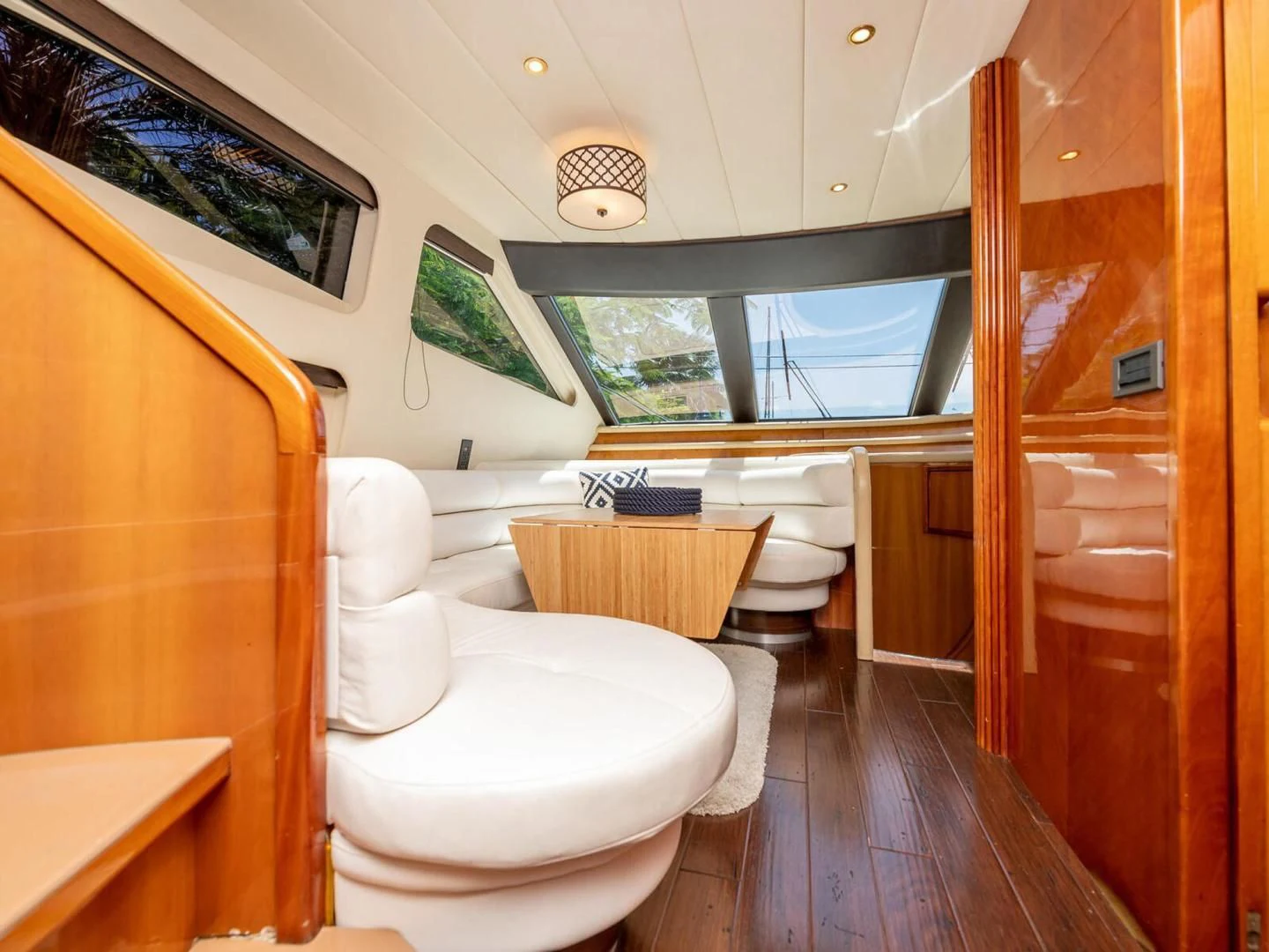 a bathroom with a wood floor aboard NUEVA OLA Yacht for Sale
