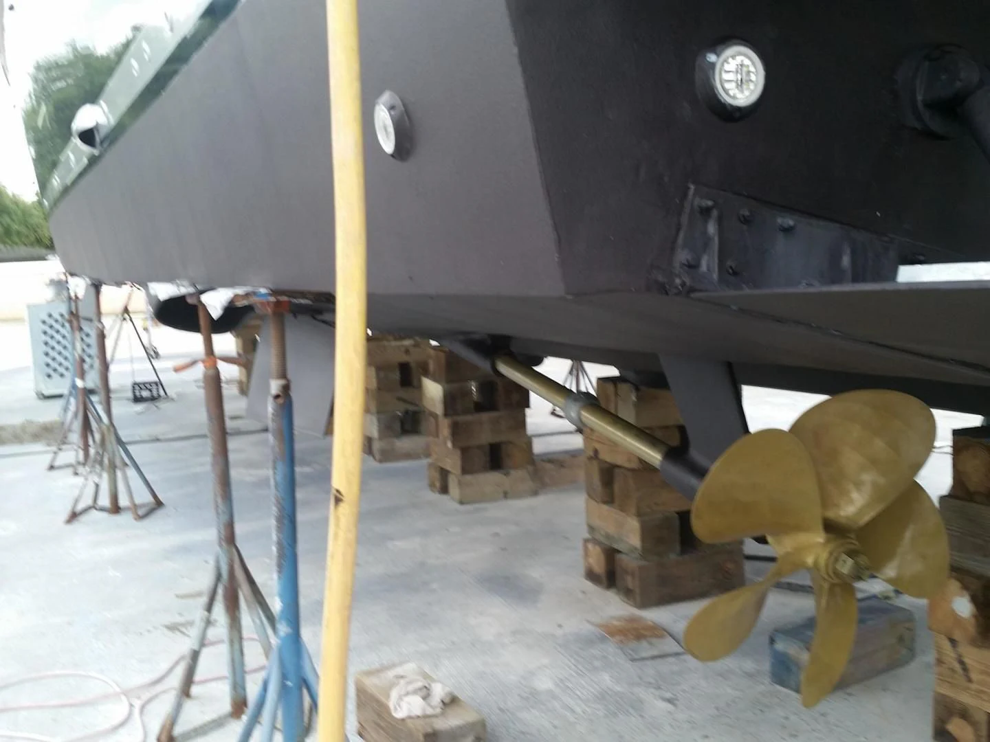 a large black object with a yellow stick on it aboard NUEVA OLA Yacht for Sale