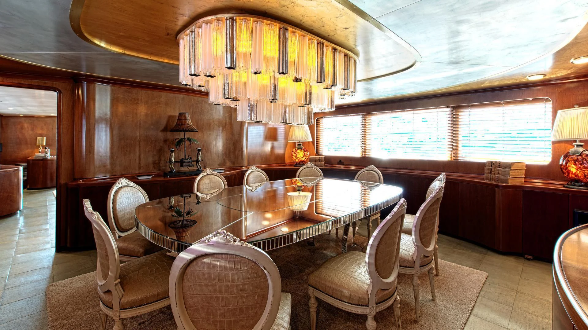 a large kitchen with a dining table aboard SIRAHMY Yacht for Sale