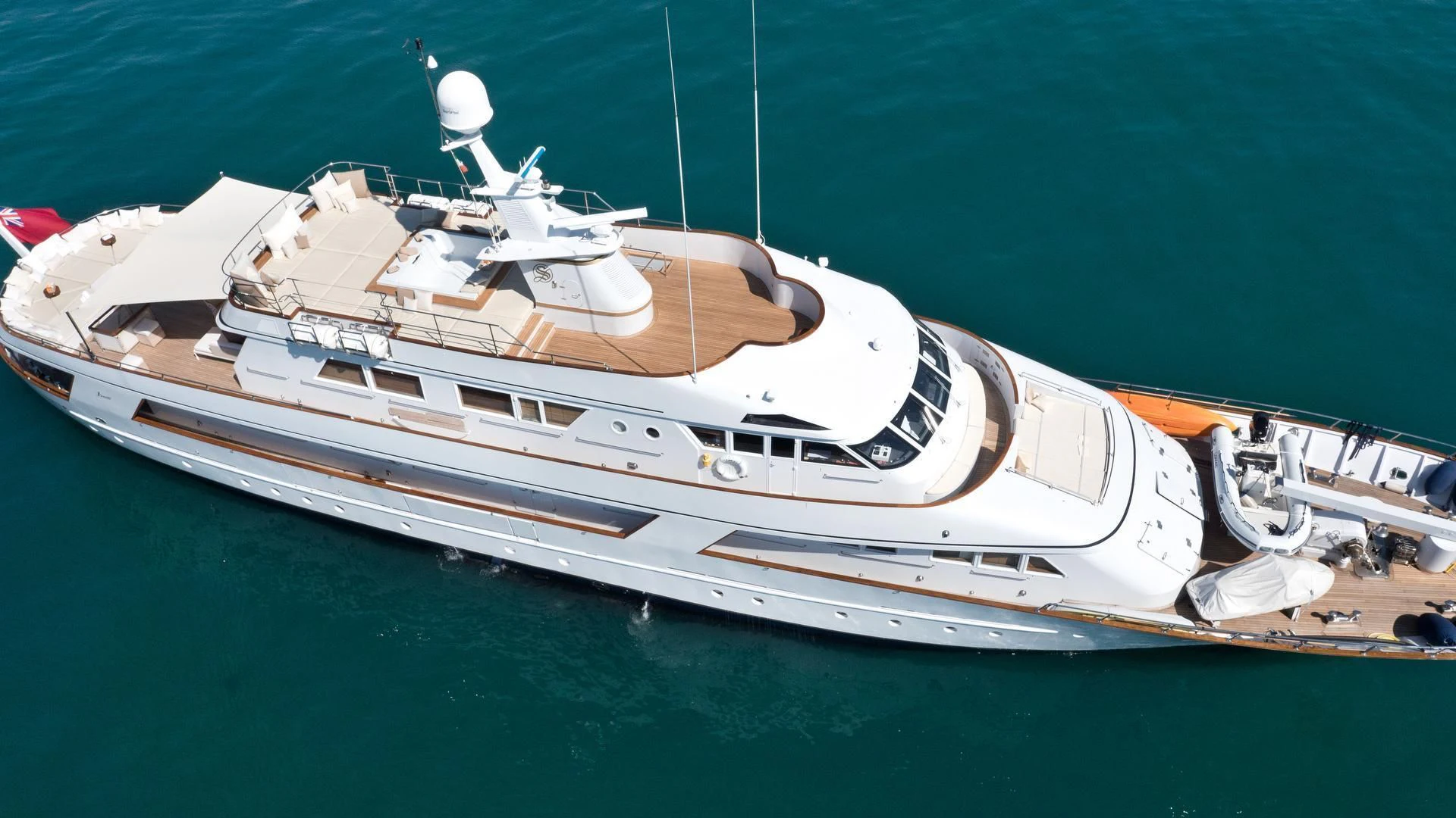 a white yacht in the water aboard SIRAHMY Yacht for Sale