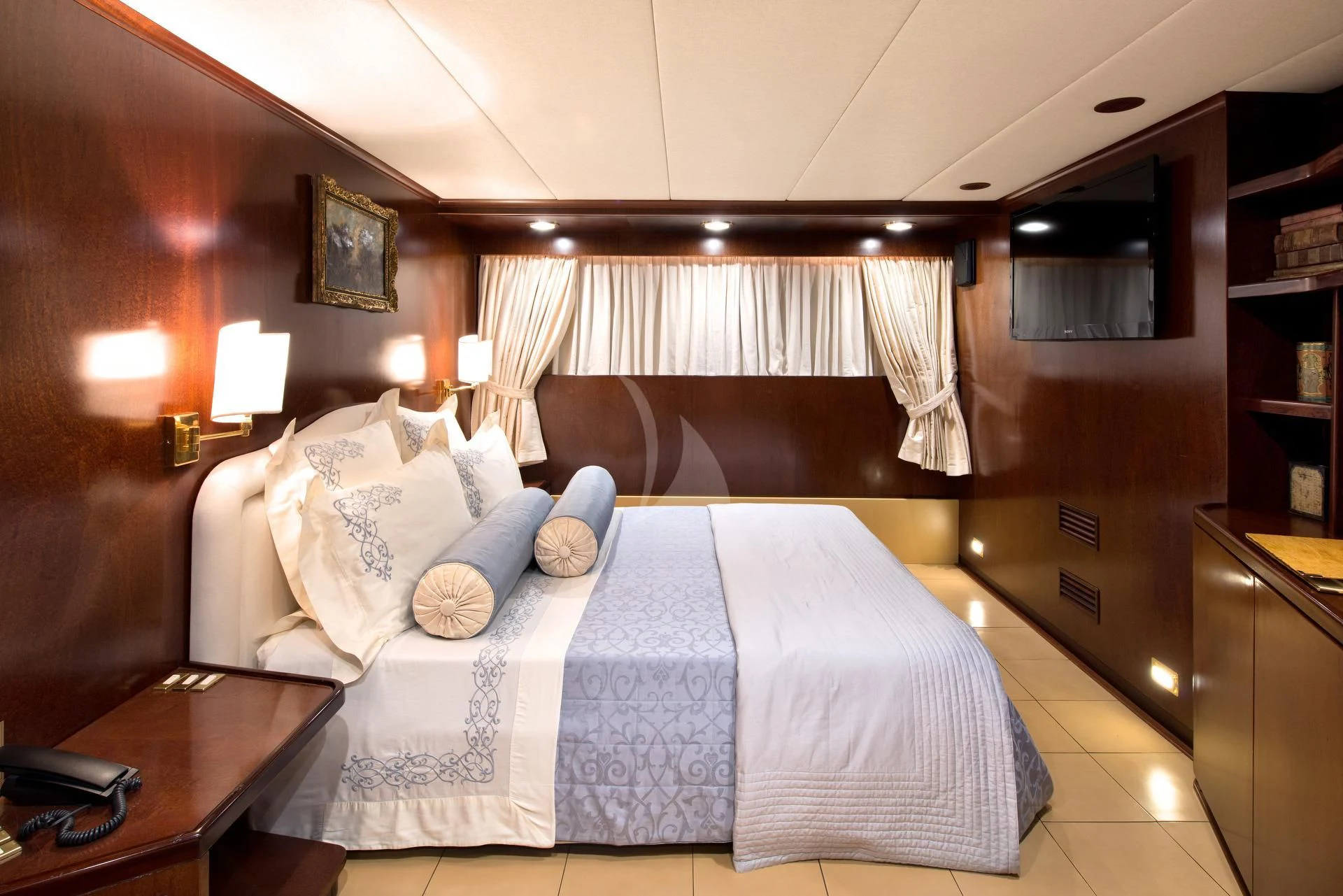 a bed in a room aboard SIRAHMY Yacht for Sale