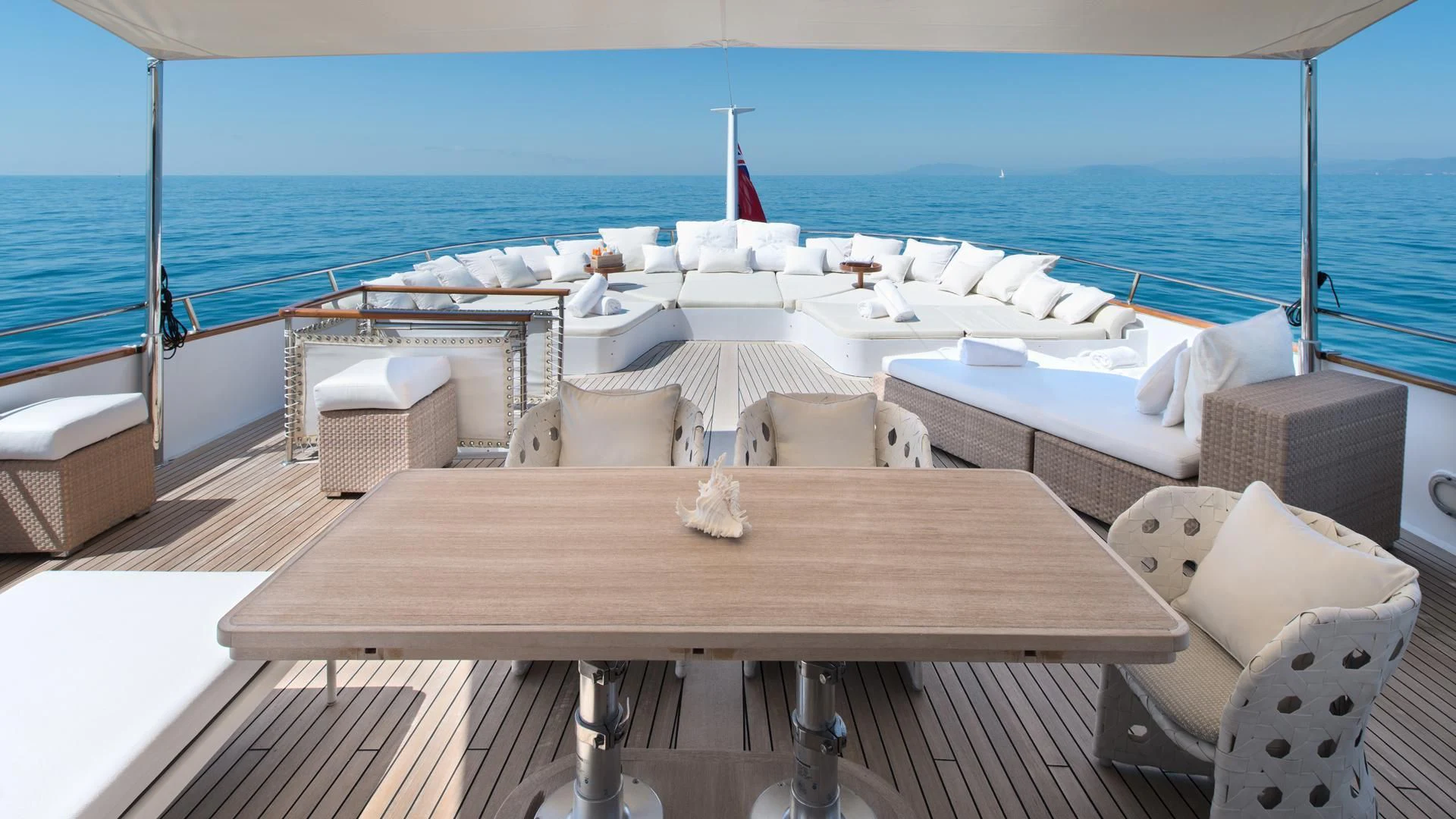 a table on a boat aboard SIRAHMY Yacht for Sale