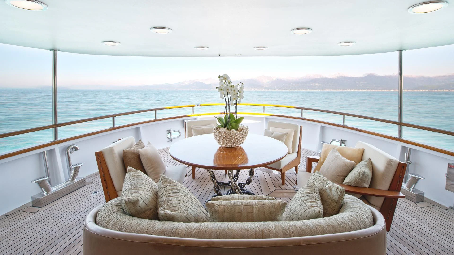 a large balcony overlooking a body of water aboard SIRAHMY Yacht for Sale