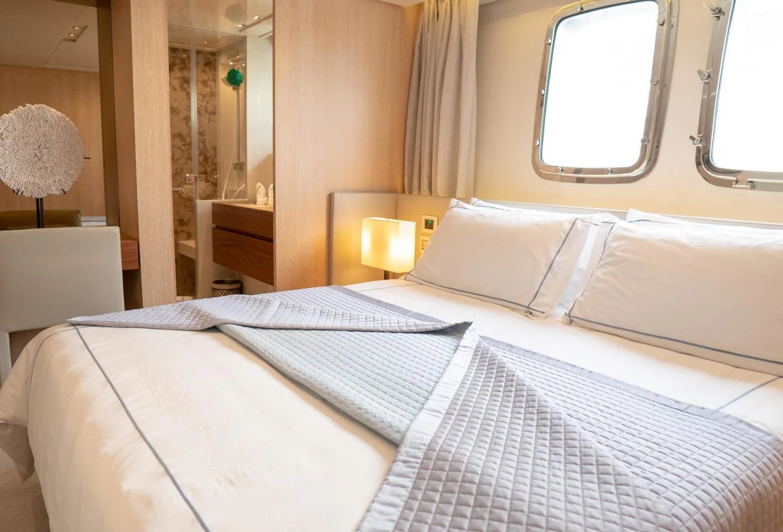 a bed with white sheets aboard GOLDEN YACHT Yacht for Sale