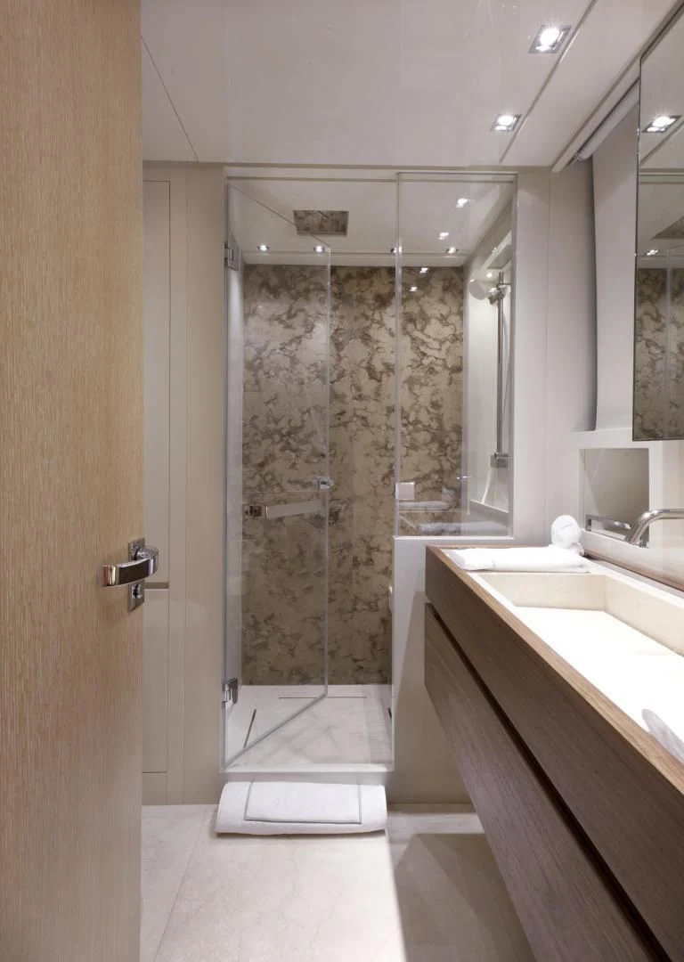 a bathroom with a glass shower aboard GOLDEN YACHT Yacht for Sale